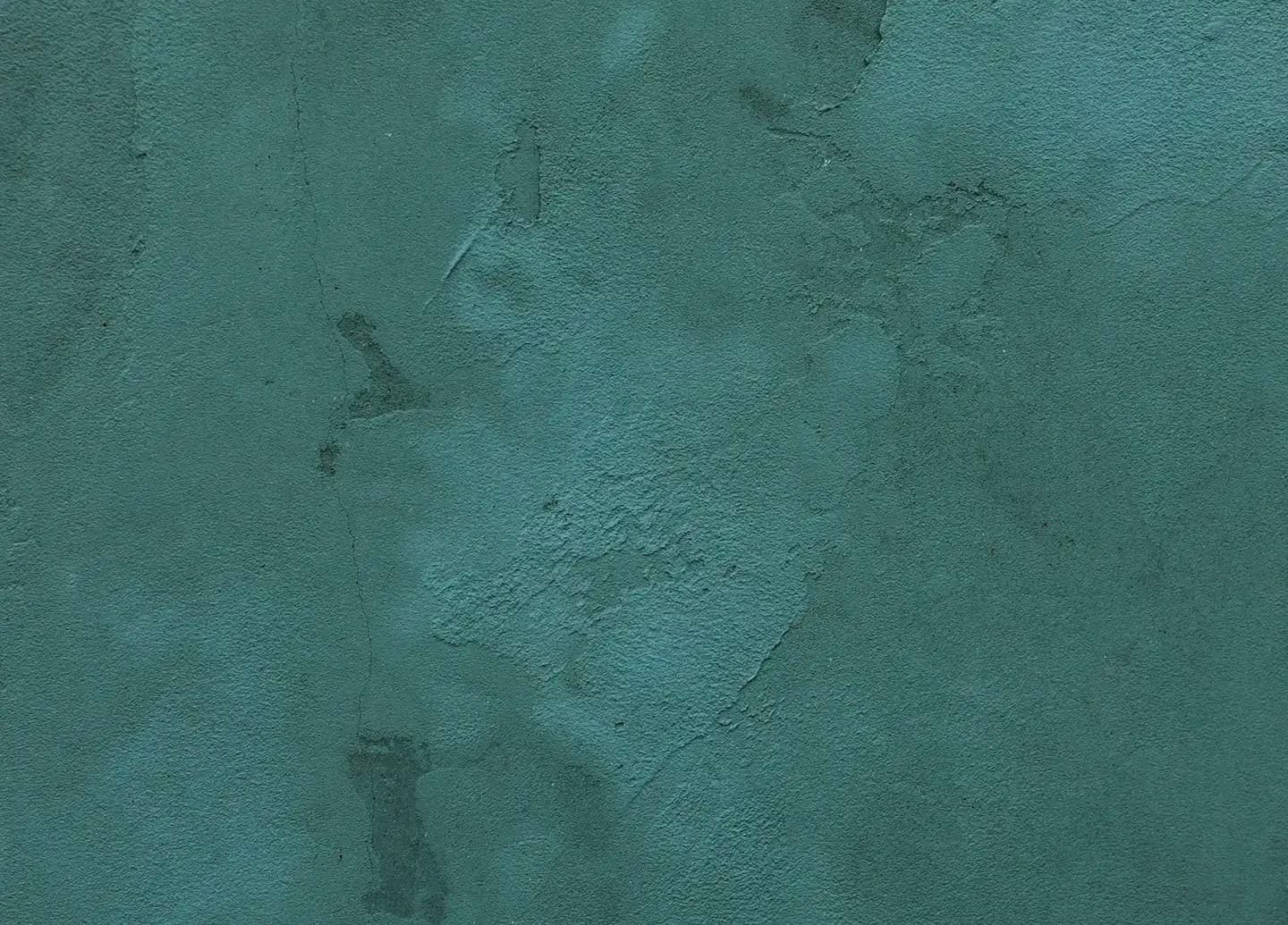 Abstract dark teal textured brushstrokes resembling a painted canvas.
