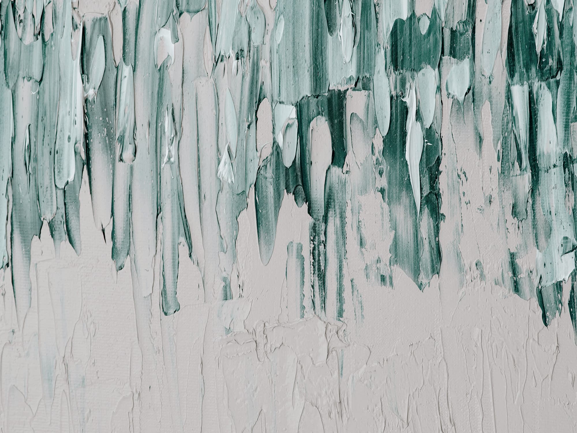 A white canvas featuring textured artwork, with layered brush strokes in varying shades of teal flowing vertically from top to midway down.